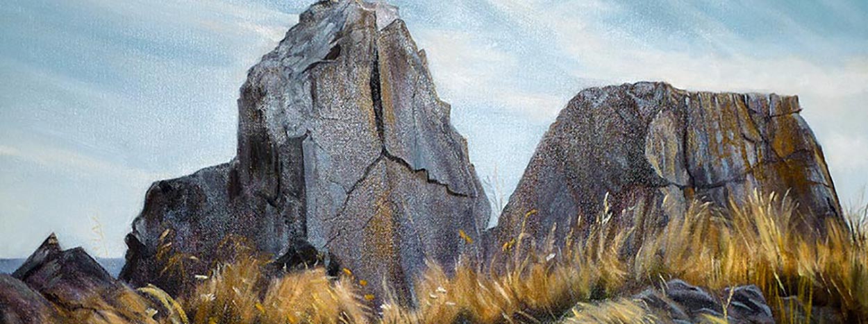 A painting of rocks and grass